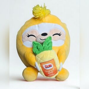 Zuru Snackles Series 2 Sandy the Sloth plush toy paired with Dole Pineapple